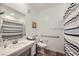Clean and tidy bathroom with a modern vanity, tiled floors and a toilet at 2555 Hampton Rd # 2108, Henderson, NV 89052