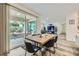 Dining area with sliding glass doors opening to an outdoor patio at 2555 Hampton Rd # 2108, Henderson, NV 89052