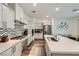 Modern kitchen featuring stainless steel appliances, light gray cabinets, and a spacious island with countertops at 2555 Hampton Rd # 2108, Henderson, NV 89052