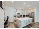 Modern kitchen featuring stainless steel appliances, an island and sleek finishes at 2555 Hampton Rd # 2108, Henderson, NV 89052
