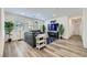 Cozy living room with wood floors, neutral decor, and an abundance of natural light at 2555 Hampton Rd # 2108, Henderson, NV 89052