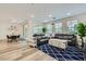 Inviting living room showcasing wood floors, modern furniture, and an open layout at 2555 Hampton Rd # 2108, Henderson, NV 89052