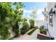 Charming backyard with manicured landscaping and a cozy patio area at 285 Rain Quail Way, Henderson, NV 89012