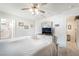 Bedroom with ensuite bathroom and built-in TV at 285 Rain Quail Way, Henderson, NV 89012