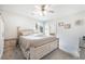 Bright bedroom featuring neutral walls, carpet, ceiling fan and furnishings at 285 Rain Quail Way, Henderson, NV 89012