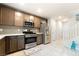 This kitchen features stainless steel appliances and ample cabinet space at 285 Rain Quail Way, Henderson, NV 89012