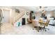 This living room features tile flooring, wine storage, and a staircase to the upper level at 285 Rain Quail Way, Henderson, NV 89012