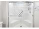 Glass shower with built in seating and grab bars at 285 Rain Quail Way, Henderson, NV 89012