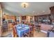 Bright dining area featuring a kitchen bar, modern appliances, and elegant furnishings at 2982 Hammerwood Dr, Las Vegas, NV 89135