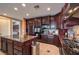 Well-equipped kitchen featuring granite countertops, stainless steel appliances, and center island at 2982 Hammerwood Dr, Las Vegas, NV 89135