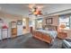 Comfortable main bedroom boasts a sitting area and access to the bathroom at 2982 Hammerwood Dr, Las Vegas, NV 89135