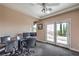 Office space with two desks, a view of the balcony, and natural light at 2982 Hammerwood Dr, Las Vegas, NV 89135
