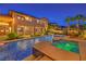 Outdoor living is easy in this backyard with a pool, hot tub, and covered patio, ideal for entertaining at 2982 Hammerwood Dr, Las Vegas, NV 89135