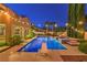 Enjoy outdoor fun in this backyard featuring a private pool, diving board, and integrated hot tub with lush landscaping at 2982 Hammerwood Dr, Las Vegas, NV 89135