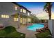 Backyard features a pool, hot tub, patio, and outdoor lighting, great for entertaining guests at 3204 Rutledge Dr, Las Vegas, NV 89120