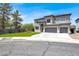 Elegant two-story home featuring a three-car garage, well-maintained landscaping, and a neutral color palette at 3204 Rutledge Dr, Las Vegas, NV 89120