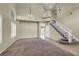 Living room features carpeted flooring and a staircase at 3204 Rutledge Dr, Las Vegas, NV 89120
