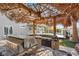 Outdoor kitchen and tiki bar area, complete with a grill and ample counter space for entertaining at 3204 Rutledge Dr, Las Vegas, NV 89120