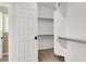 Walk-in closet with carpeting, shelving, and racks for optimal organization and storage space at 3204 Rutledge Dr, Las Vegas, NV 89120