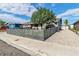 Charming single-story home featuring a modern horizontal fence and well-maintained landscaping at 3682 Deer Creek Way, Las Vegas, NV 89115
