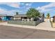 Charming single-story home featuring a modern horizontal fence and well-maintained landscaping at 3682 Deer Creek Way, Las Vegas, NV 89115
