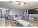 Bright and cozy living room featuring stylish decor, wood flooring, and comfortable seating at 3682 Deer Creek Way, Las Vegas, NV 89115
