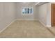 Bright dining area with tile flooring and a large window at 3957 Placita Del Lazo, Las Vegas, NV 89120