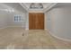 Spacious foyer with decorative double doors and ample natural light at 3957 Placita Del Lazo, Las Vegas, NV 89120