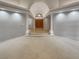 Grand foyer with columns and arched ceiling, leading to a spacious area at 3957 Placita Del Lazo, Las Vegas, NV 89120