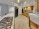 Modern kitchen with stainless steel appliances and light wood cabinets at 3957 Placita Del Lazo, Las Vegas, NV 89120