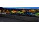 Rooftop deck with nighttime neighborhood views at 3980 Heron Fairway Dr, Las Vegas, NV 89141