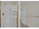 Shower with gold trim and updated fixtures in a bathroom with tile flooring at 4139 Abernethy Forest Pl, Las Vegas, NV 89141