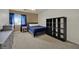 Bedroom with neutral walls, carpet, shelving and curtains at 4139 Abernethy Forest Pl, Las Vegas, NV 89141