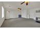 Bonus room with carpet, three doors, a ceiling fan and a work station at 4139 Abernethy Forest Pl, Las Vegas, NV 89141