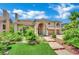 Gorgeous two-story home with lush landscaping and a charming entrance in a desirable Las Vegas community at 4139 Abernethy Forest Pl, Las Vegas, NV 89141