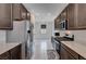 Well-equipped kitchen featuring stainless steel appliances and ample counter space at 4293 Nopal Serrano Ave, Las Vegas, NV 89141