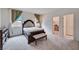 Relaxing main bedroom with walk-in closet, carpet, and natural light at 4293 Nopal Serrano Ave, Las Vegas, NV 89141
