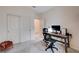 This office features a sliding door closet, a built in desk and an abundance of natural light at 4293 Nopal Serrano Ave, Las Vegas, NV 89141