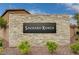 Community sign featuring the name Saguaro Ranch in front of decorative stonework and desert landscaping at 4293 Nopal Serrano Ave, Las Vegas, NV 89141