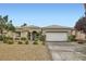 Charming single-story home featuring well-maintained landscaping and a two-car garage at 4311 Fiore Bella Blvd, Las Vegas, NV 89135