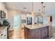 Well-equipped kitchen with gas range, granite counters, and stainless-steel appliances at 4311 Fiore Bella Blvd, Las Vegas, NV 89135