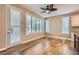 Bright and airy living room with hardwood floors and plantation shutters at 4311 Fiore Bella Blvd, Las Vegas, NV 89135