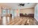 Large living room featuring hardwood floors and custom built-ins at 4311 Fiore Bella Blvd, Las Vegas, NV 89135
