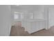 Hallway with carpet and white cabinets at 4807 Leadership Ct, North Las Vegas, NV 89031