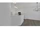Bright, modern kitchen features white cabinets and stainless steel appliances at 4807 Leadership Ct, North Las Vegas, NV 89031
