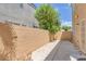 Private backyard patio surrounded by a block wall at 4807 Leadership Ct, North Las Vegas, NV 89031