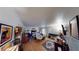 Bedroom with hardwood floors, natural light, ample furniture, and cozy decor at 4998 Schumann Dr, Las Vegas, NV 89146