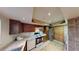 Cozy kitchen featuring ample counter space, stainless steel appliances, and wood cabinets at 4998 Schumann Dr, Las Vegas, NV 89146