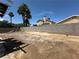 Large backyard with cinder block fence, a swing set, and great sun exposure at 5128 Sandstone Dr, Las Vegas, NV 89142