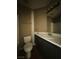 Bathroom with a toilet, vanity, mirror, and bright lighting above the sink at 5128 Sandstone Dr, Las Vegas, NV 89142